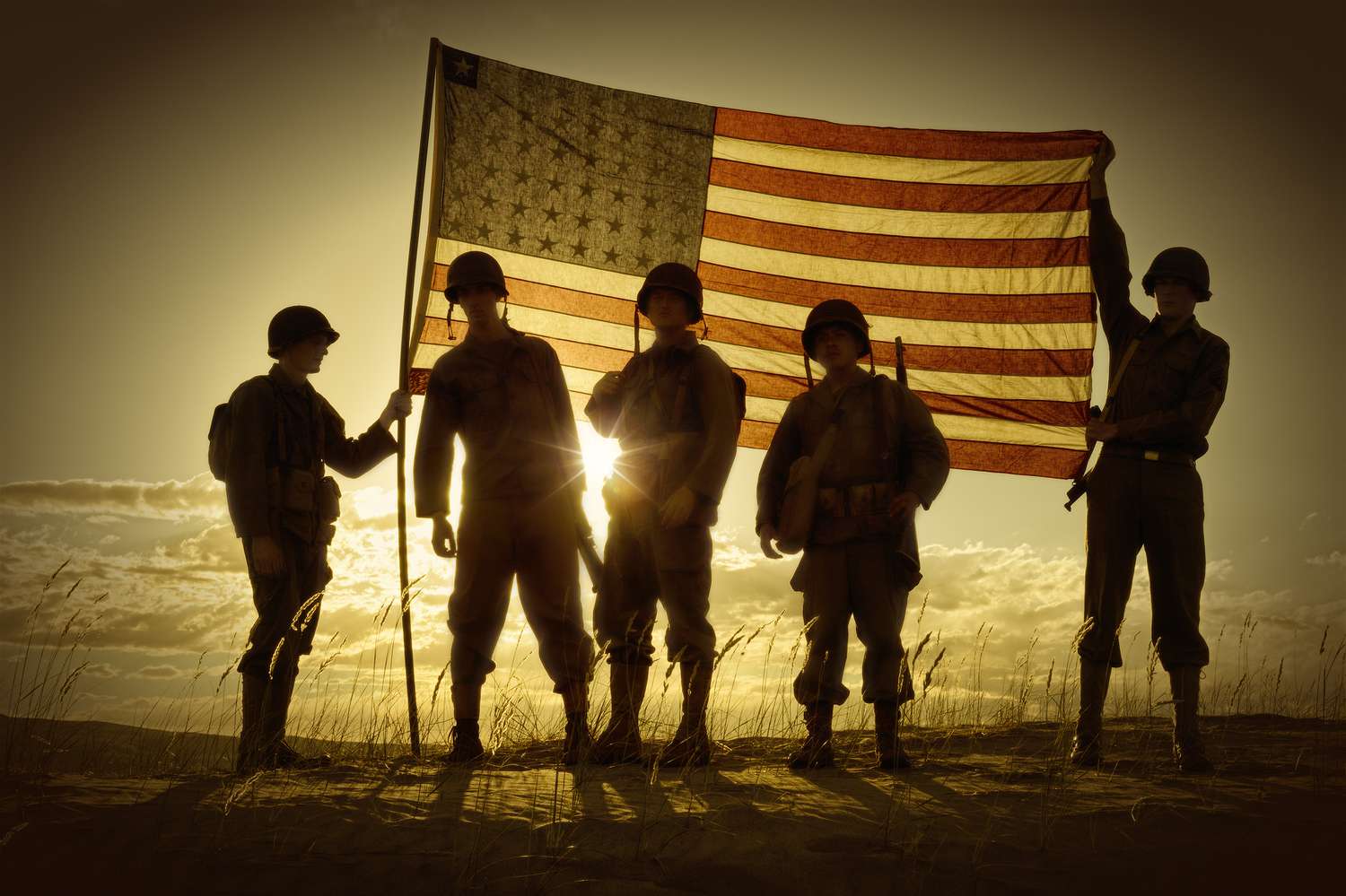 silhouette of soldiers with american flag 186546665 5c7ac4ff46e0fb0001edc832